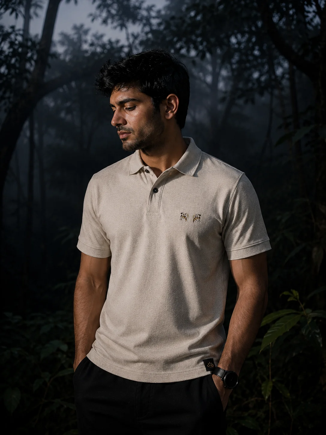Silent Prowl Tiger Eyes Textured Polo — model in misty pre-dawn forest, white polo against dark jungle